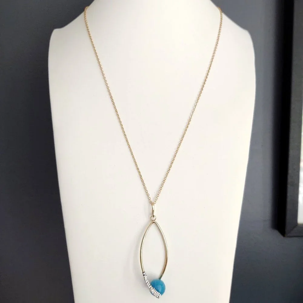 Blue bead, cz and gold pendant necklace